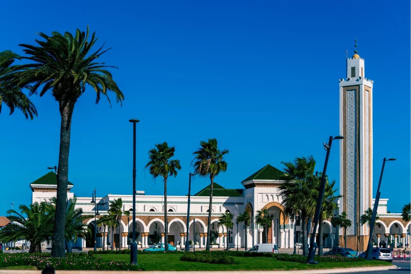 Mosque Under Cobalt. White and cobalt present the building as a clear mark on the horizon.