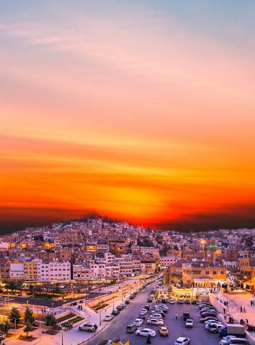 Sunset Boulevard. A broad boulevard receiving the day's last warmth before it fades.