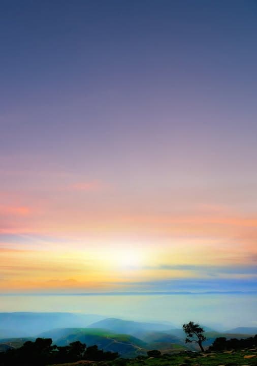 First Light Over the Hills. Distant hills slowly revealed under the first light of day.