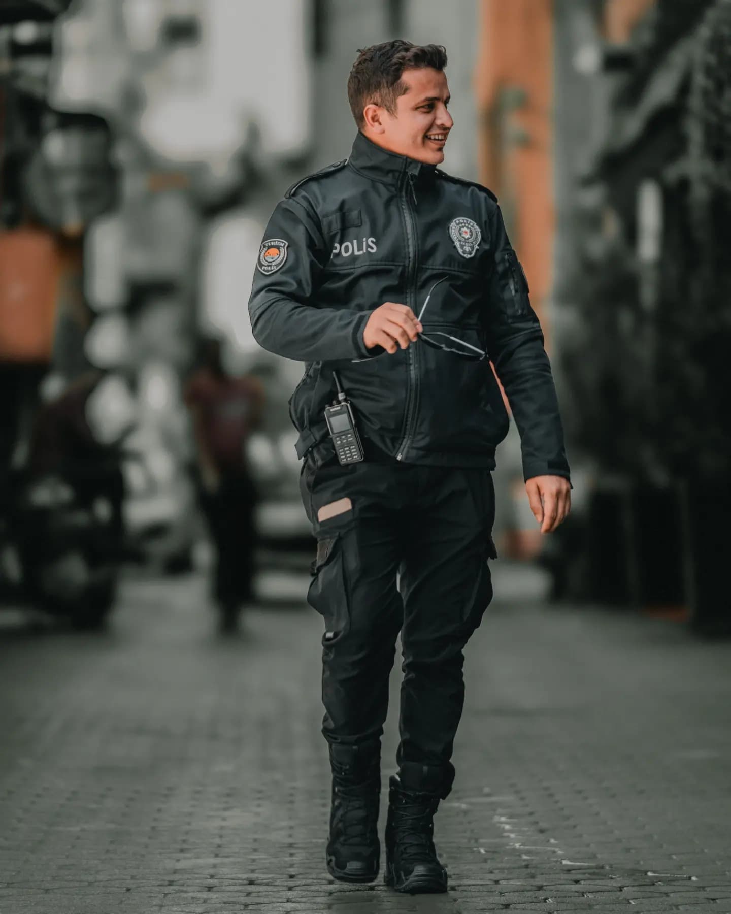 Passing Figure. A lone passerby cuts through the frame and gives it its own time.