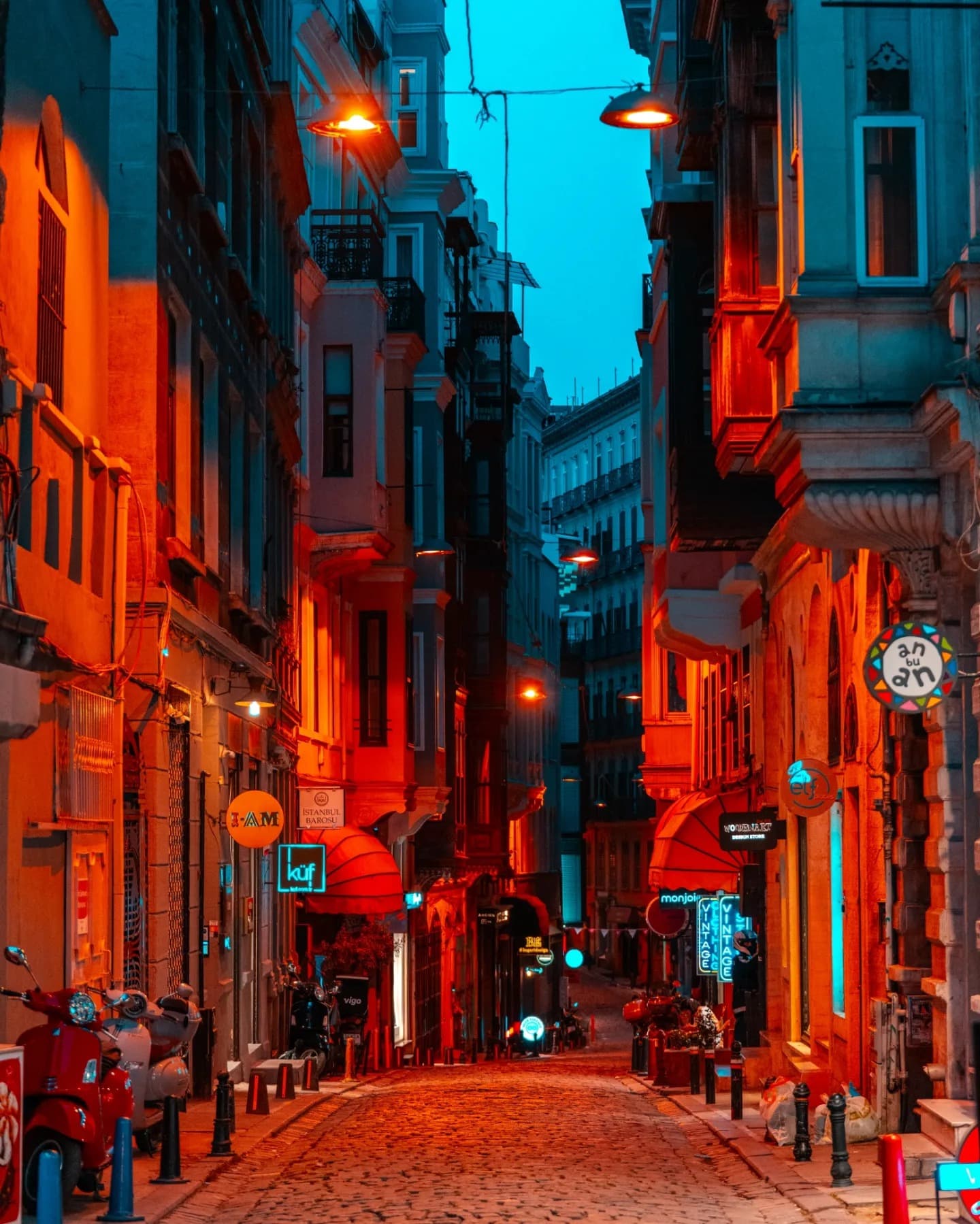 Red Alley. A single sharp color leads the eye through a narrow alley.