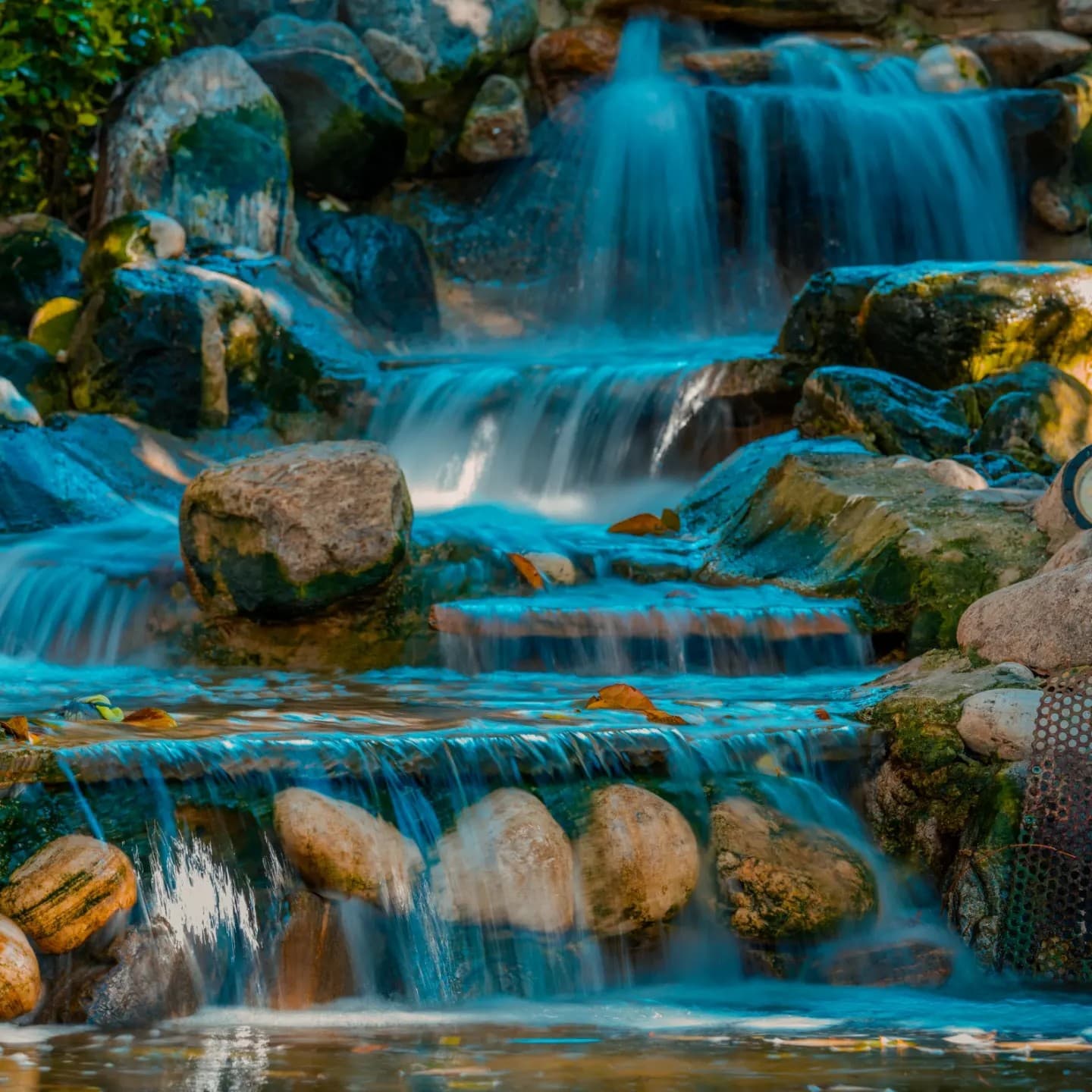 Cascading Stones. Water and stone merge into a softened tactile image.