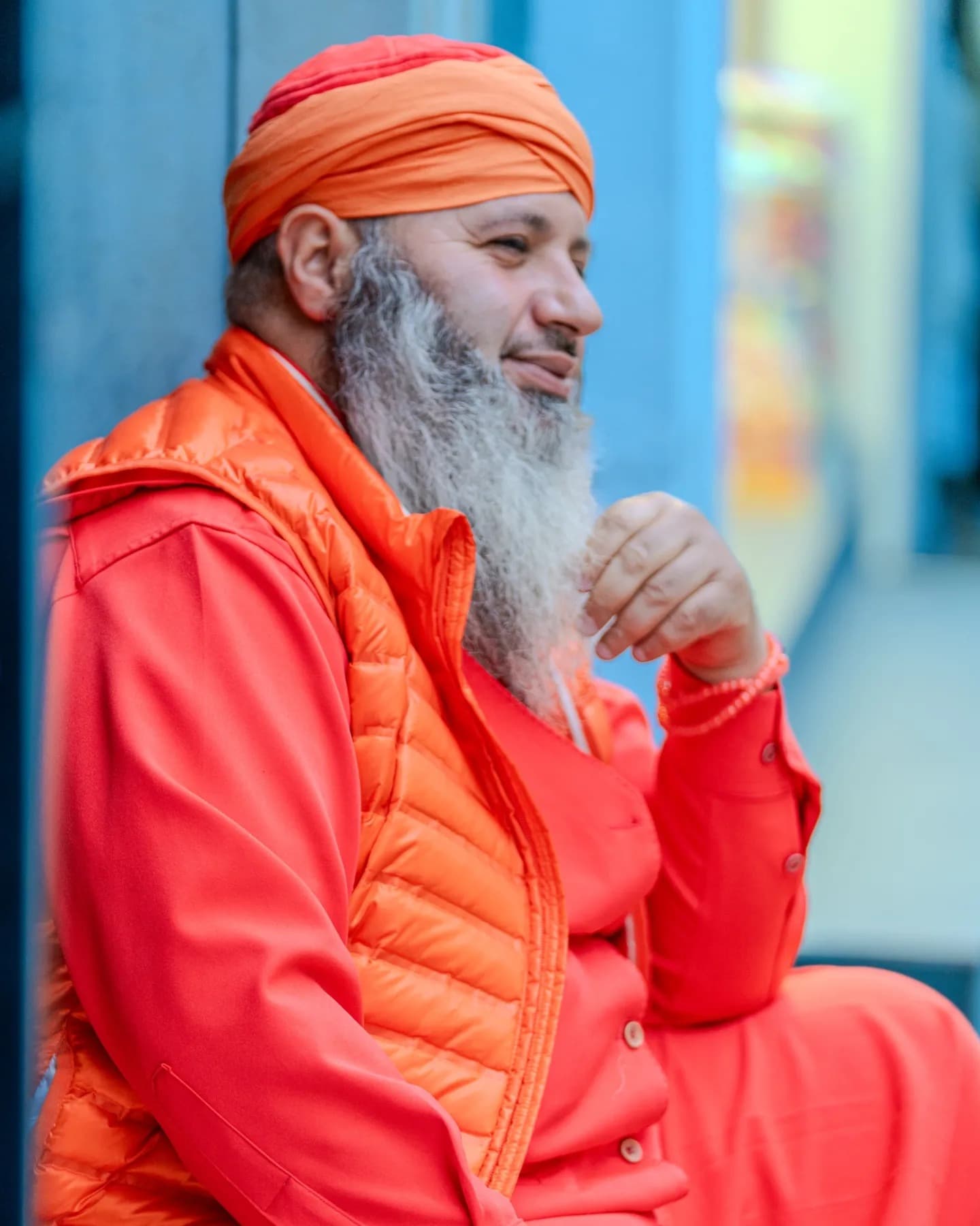 Seated in Red. Calm seated posture balances the heat of red with stillness.