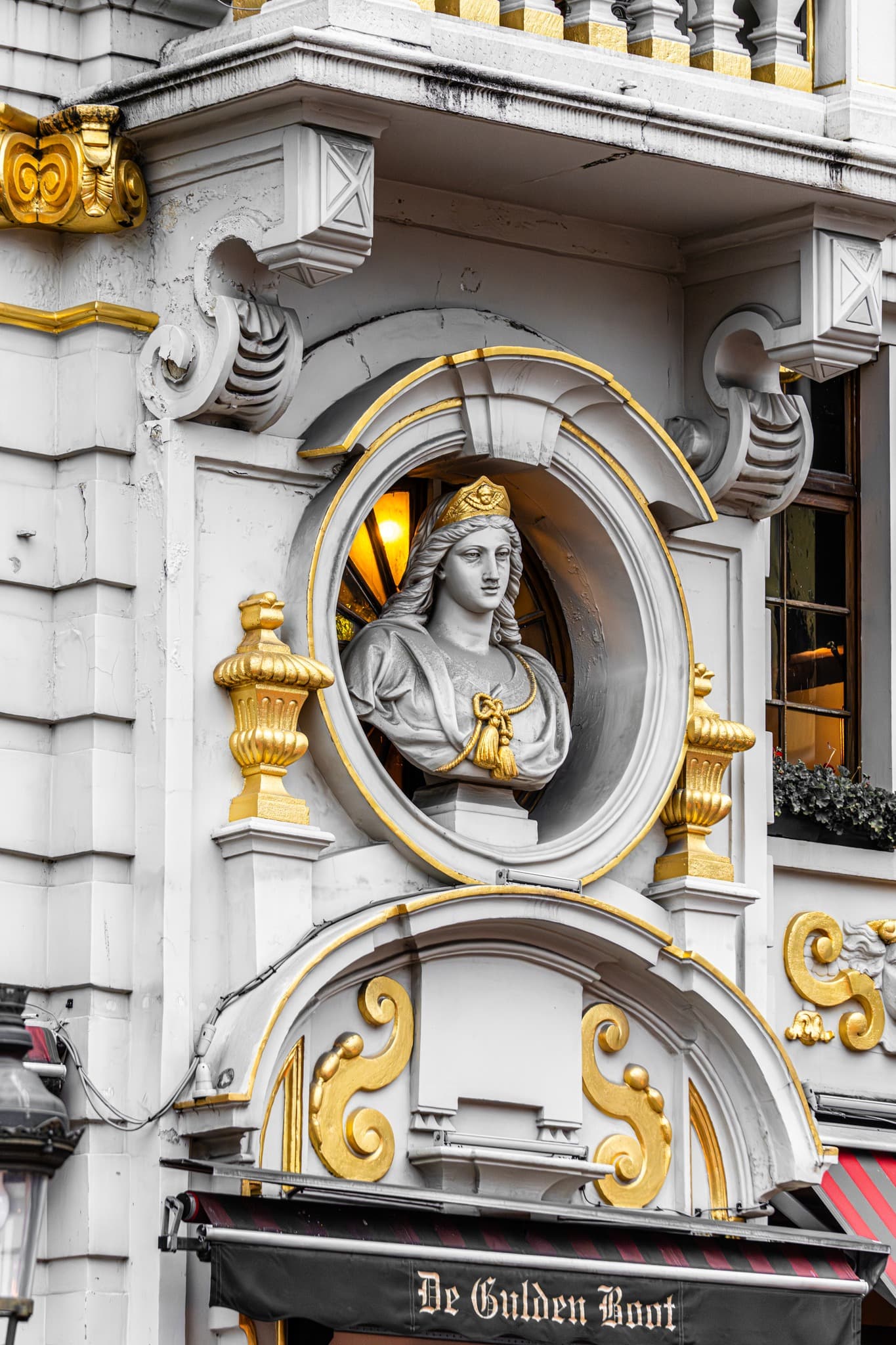 Medallion Detail. A small circular element concentrating sculptural and ornamental finesse.