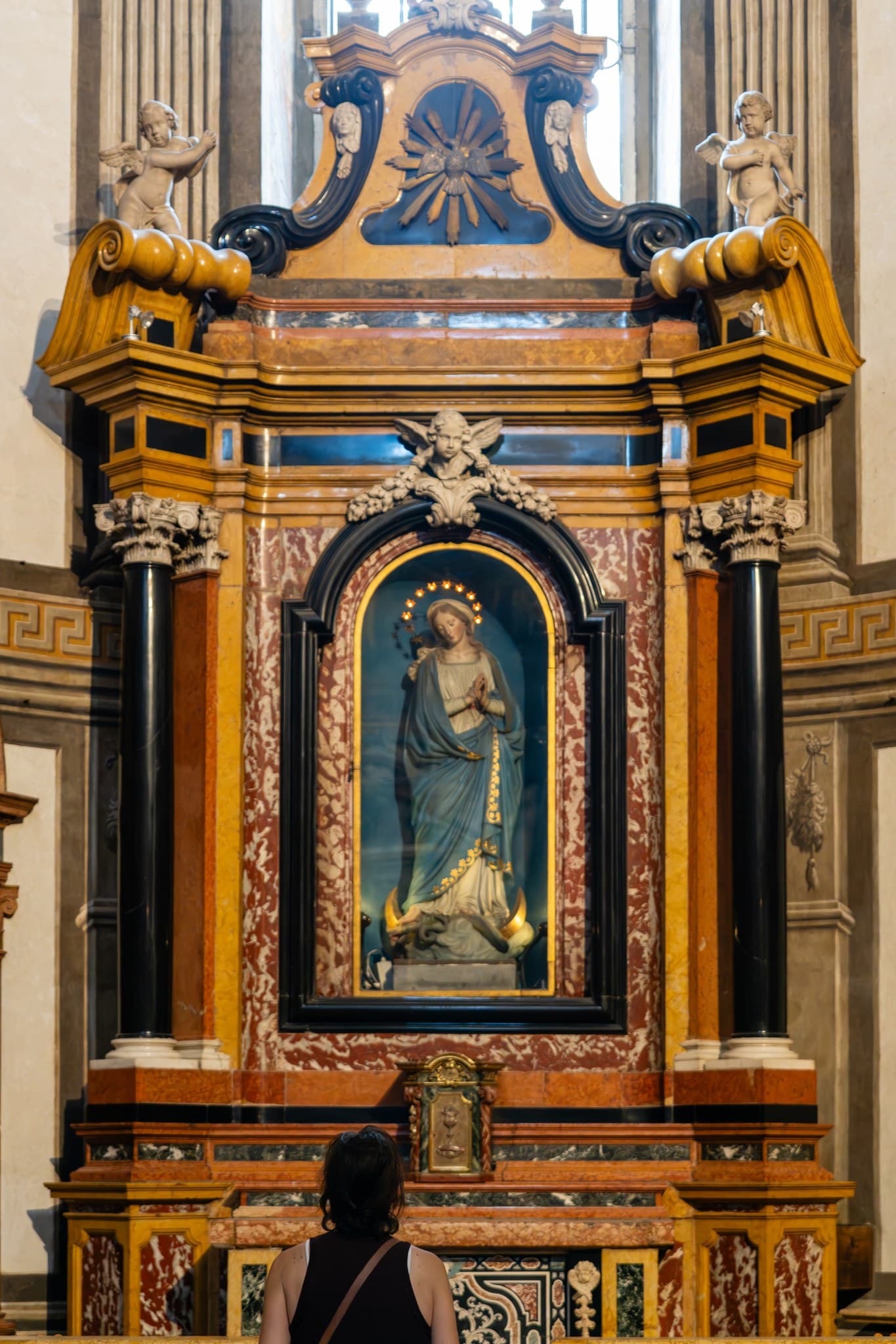 Blue Altarpiece. Blue tones lighten the ornament and give the altar a distinct clarity.
